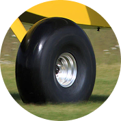 Matco aircraft wheel assembly featuring a black tire, silver rim, and integrated disc brake system.