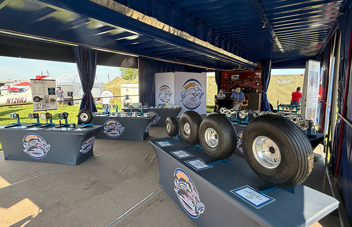 CNC machining of a metal aircraft component with coolant spray at the Matco ALS manufacturing facility.